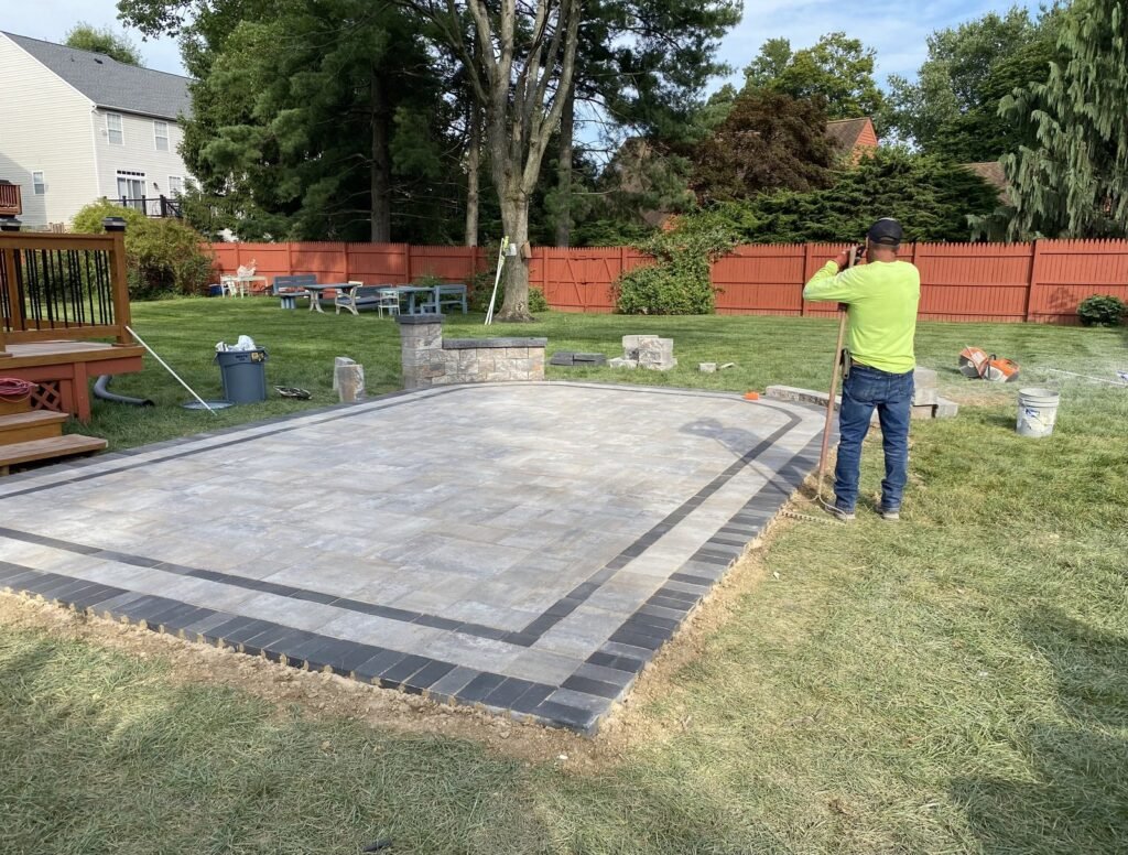 Wide view of a paver patio with contrasting border stones